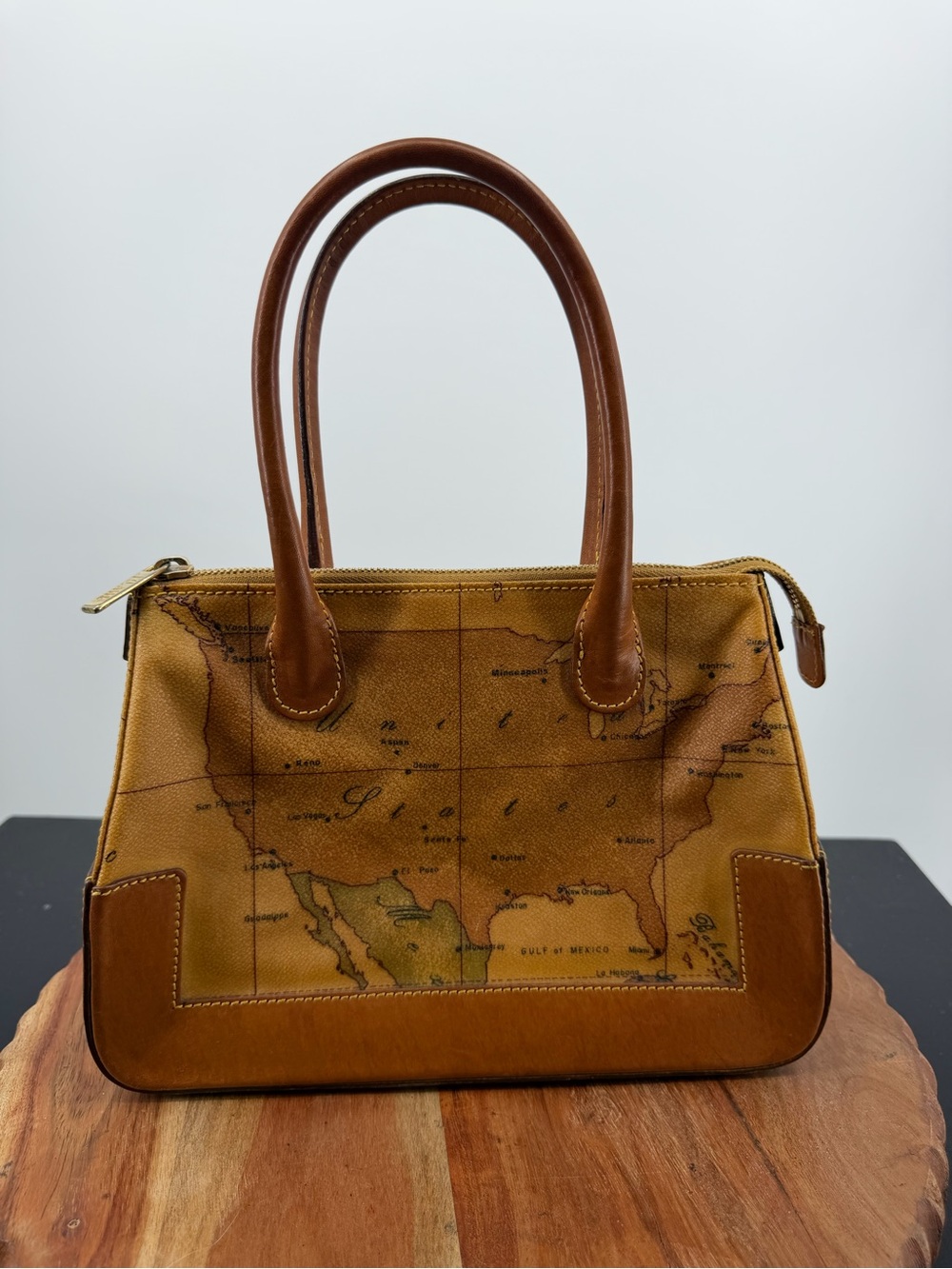 Alviero Martini 1A Classe Geo Print bag map design coated canvas leather trim